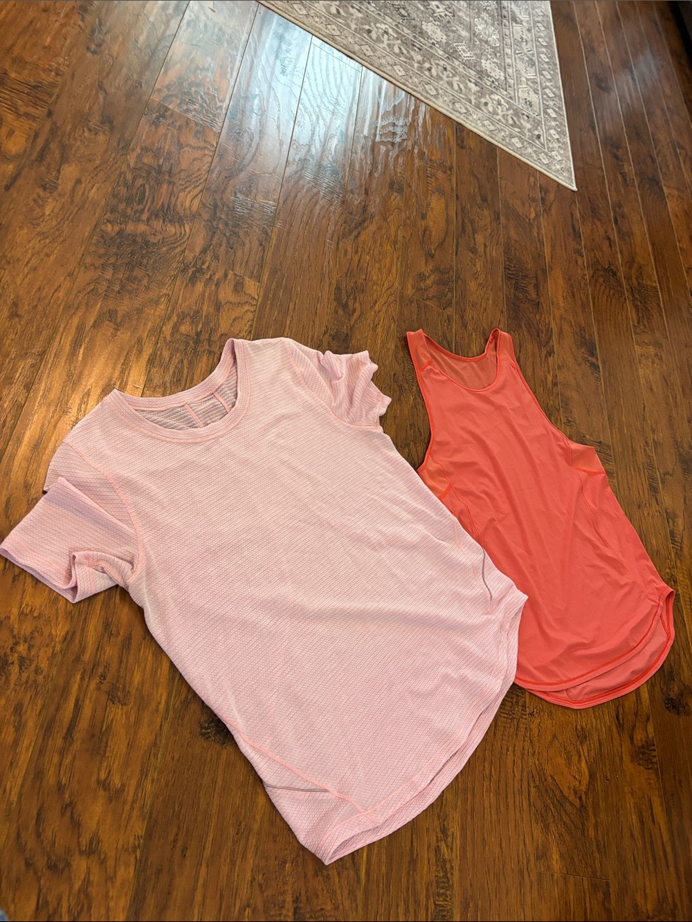 Lululemon athletic lot! 2 tops like new. No flaws. Both Measure 17.5 pit to pit